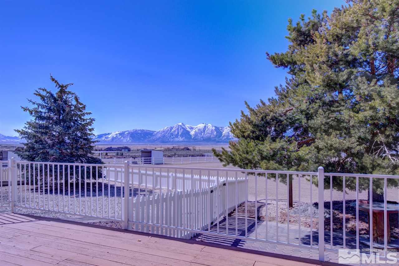 1719 Sunrise Pass Road Minden, NV 89423 - Photo 28 of 39 a view of a roof with wooden fence