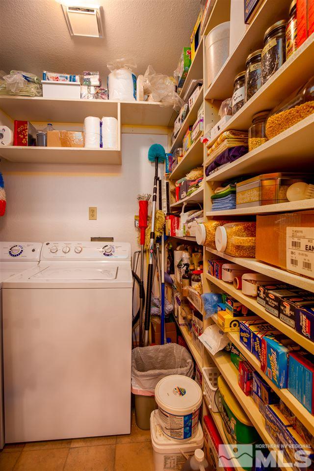 1719 Sunrise Pass Road Minden, NV 89423 - Photo 9 of 39 a utility room with dryer and washer