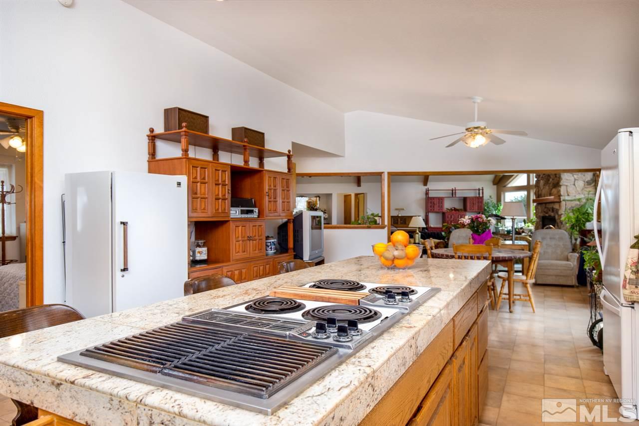 1719 Sunrise Pass Road Minden, NV 89423 - Photo 10 of 39 a bed room with a bed and furniture