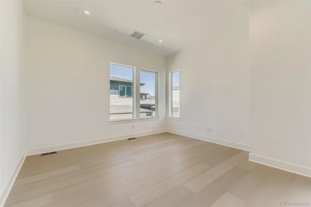 an empty room with windows