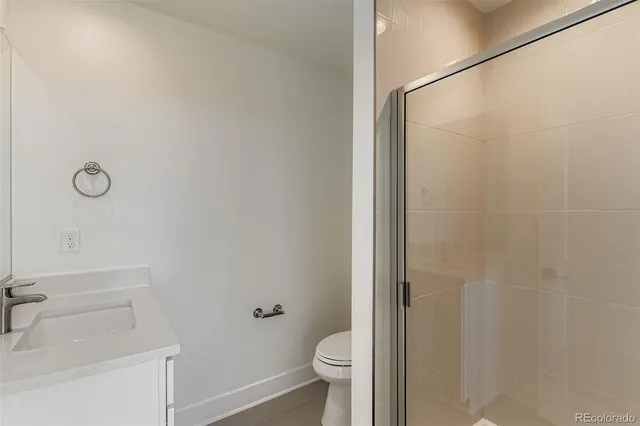 a bathroom with a sink and toilet
