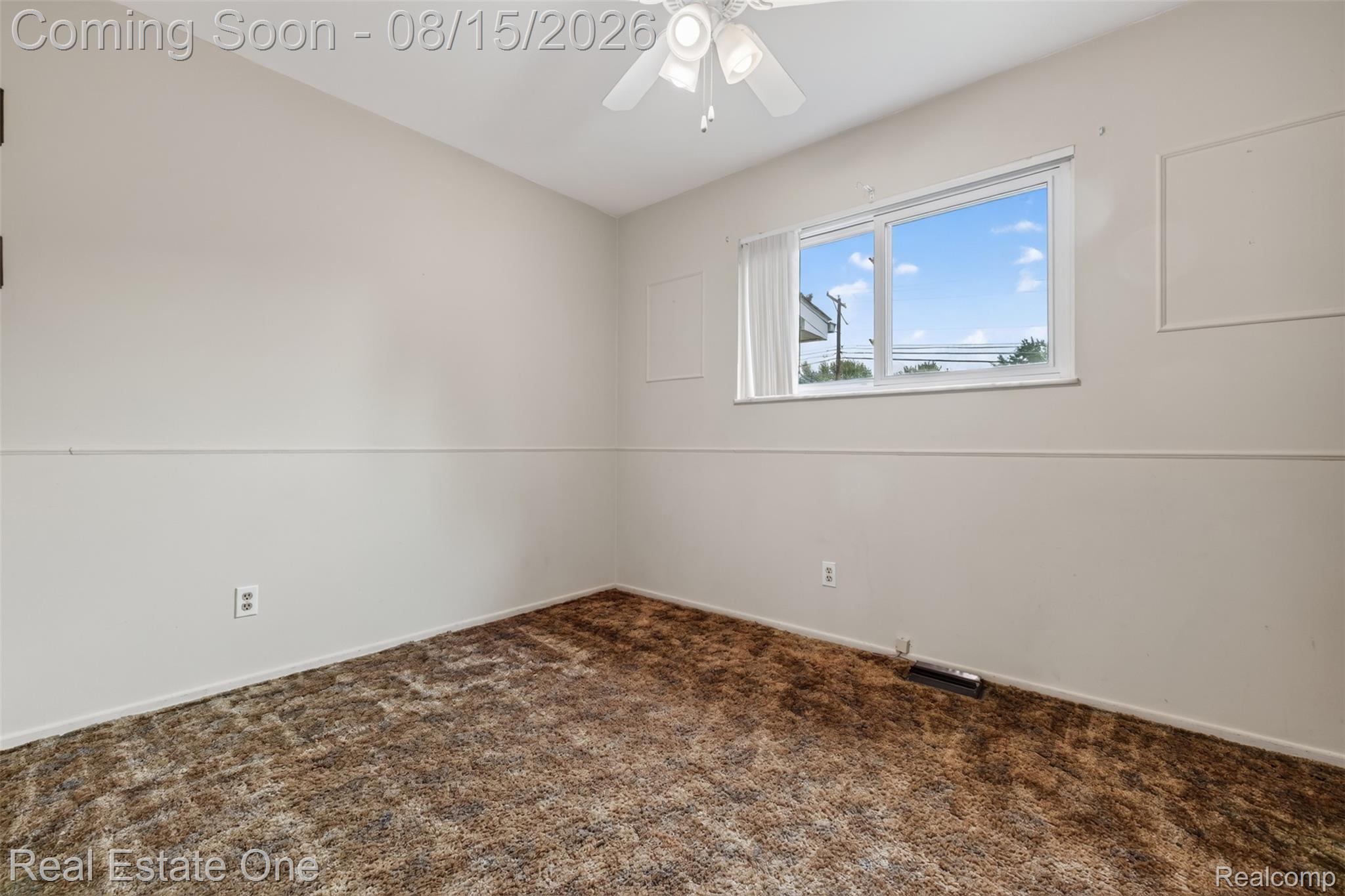 454 South Baldwin Road Oxford, MI 48371 - Photo 22 of 64 Ceiling fan, window with white trim, wall-to-wall carpeting