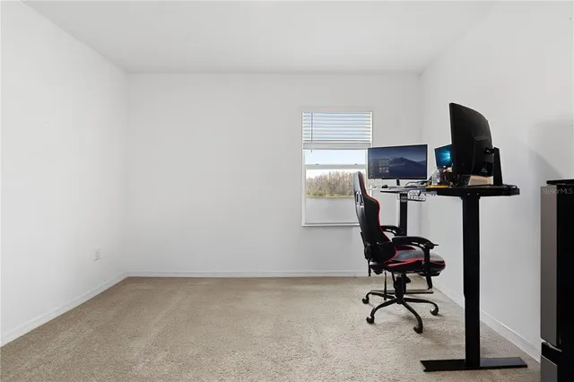 a view of workspace with gym equipment