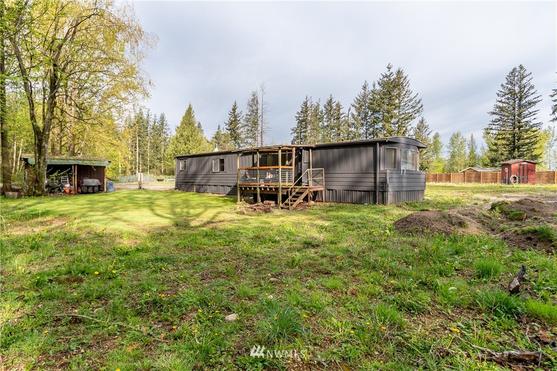 2073 East Pole Road Everson, WA 98247 - Photo 1 of 18 a view of a house with backyard and sitting area