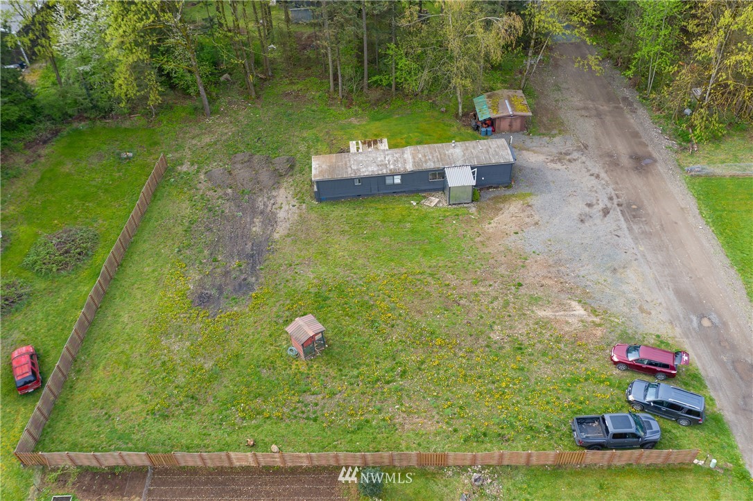 2073 East Pole Road Everson, WA 98247 - Photo 3 of 18 a backyard of a house with lots of green space