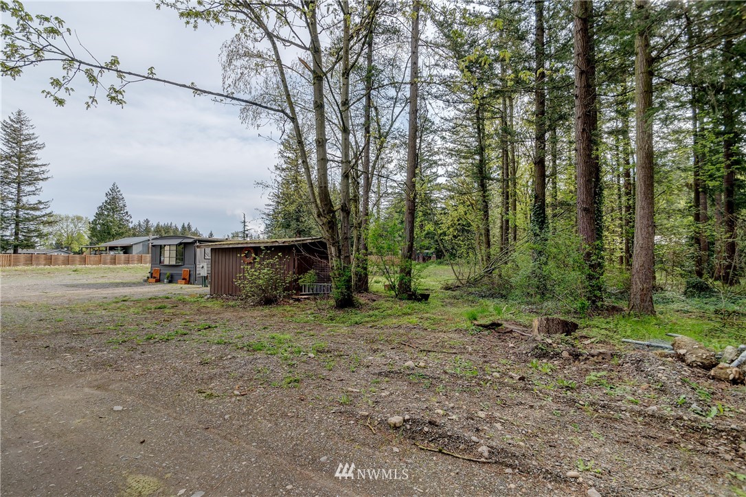 2073 East Pole Road Everson, WA 98247 - Photo 10 of 18 a view of a barn in the middle of a yard