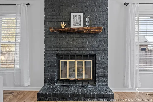 a living room with a rug