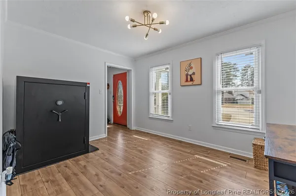 a view of an empty room with a window