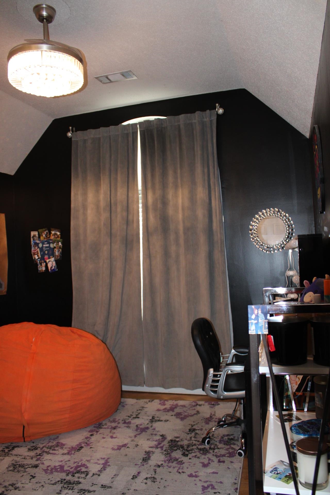64 Buck Stand Road Atoka, TN 38004 - Photo 20 of 39 a bedroom with a bed and a chandelier