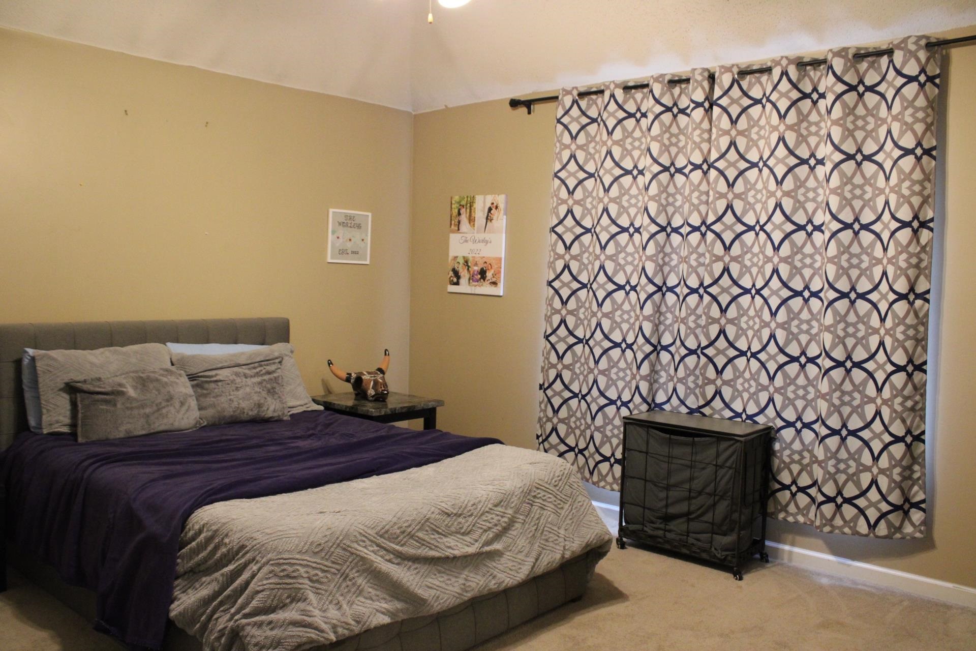 64 Buck Stand Road Atoka, TN 38004 - Photo 35 of 39 a bedroom with a bed and a fireplace