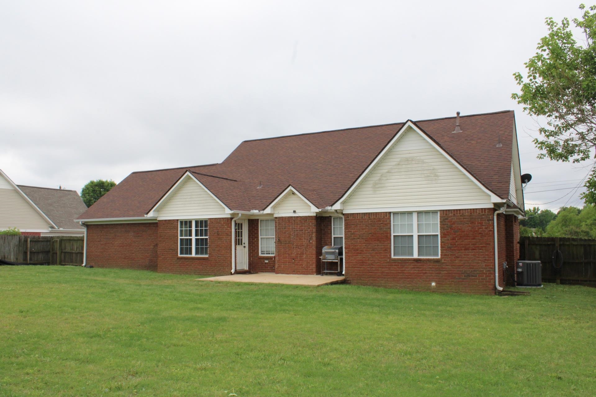 64 Buck Stand Road Atoka, TN 38004 - Photo 38 of 39 a view of a house with a yard