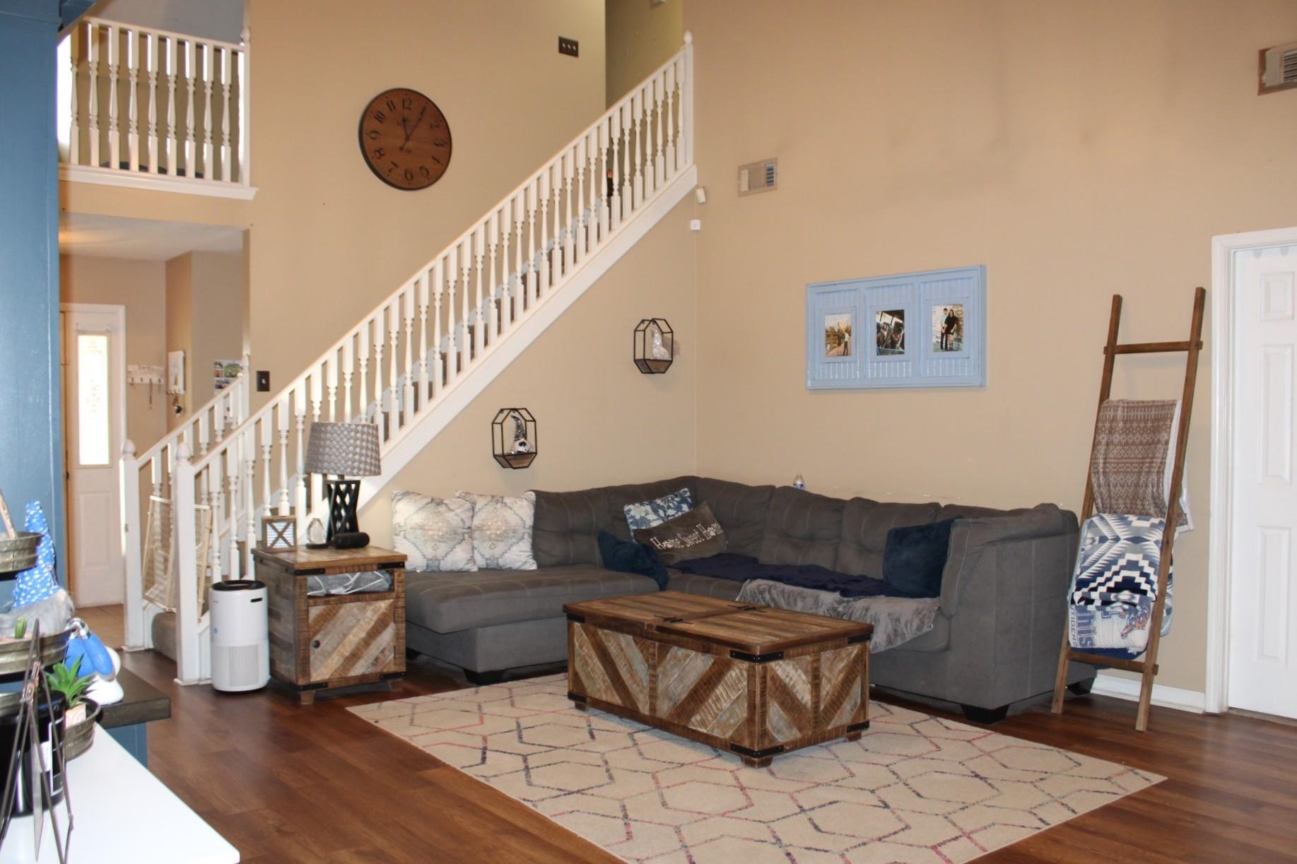 64 Buck Stand Road Atoka, TN 38004 - Photo 7 of 39 a living room with furniture and wooden floor
