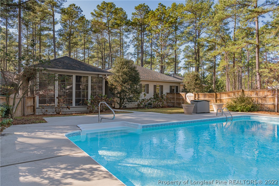 1305 Linden Road Aberdeen, NC 28315 - Photo 34 of 50 a front view of a house with swimming pool