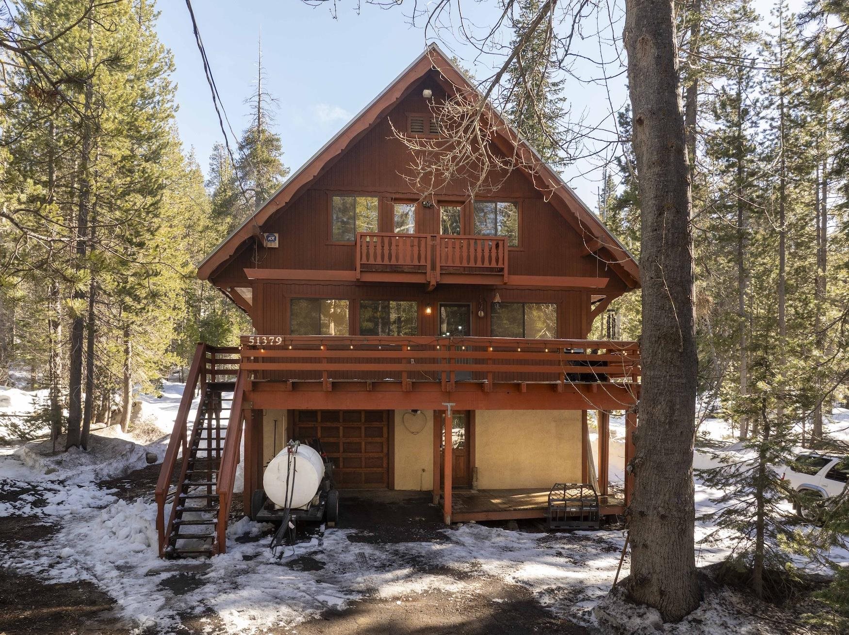 51379 Donner Pass Road Soda Springs, CA 95728 - Photo 2 of 22 a front view of a house with garden