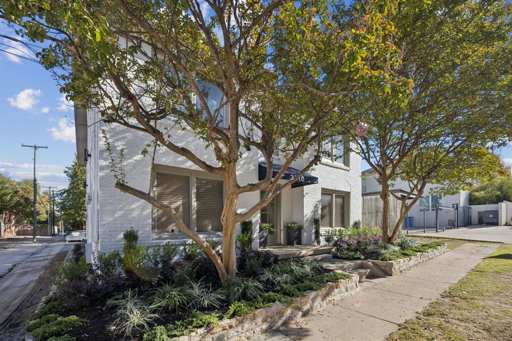 3210 North Haskell Avenue Dallas, TX 75204 - Photo 20 of 20 a front view of a house with a yard