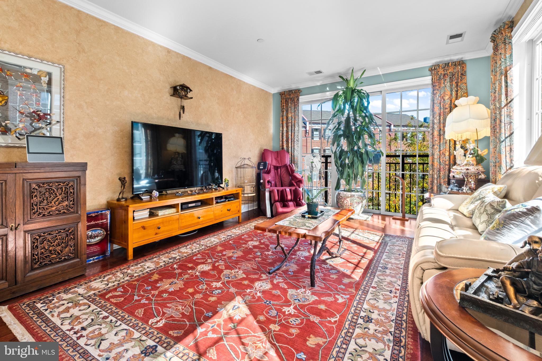 600 Commodore Court, Unit 2631 Philadelphia, PA 19146 - Photo 2 of 45 a living room with furniture and a flat screen tv