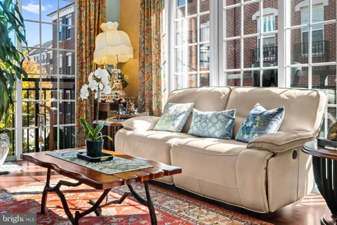 a outdoor living space with furniture and a potted plant