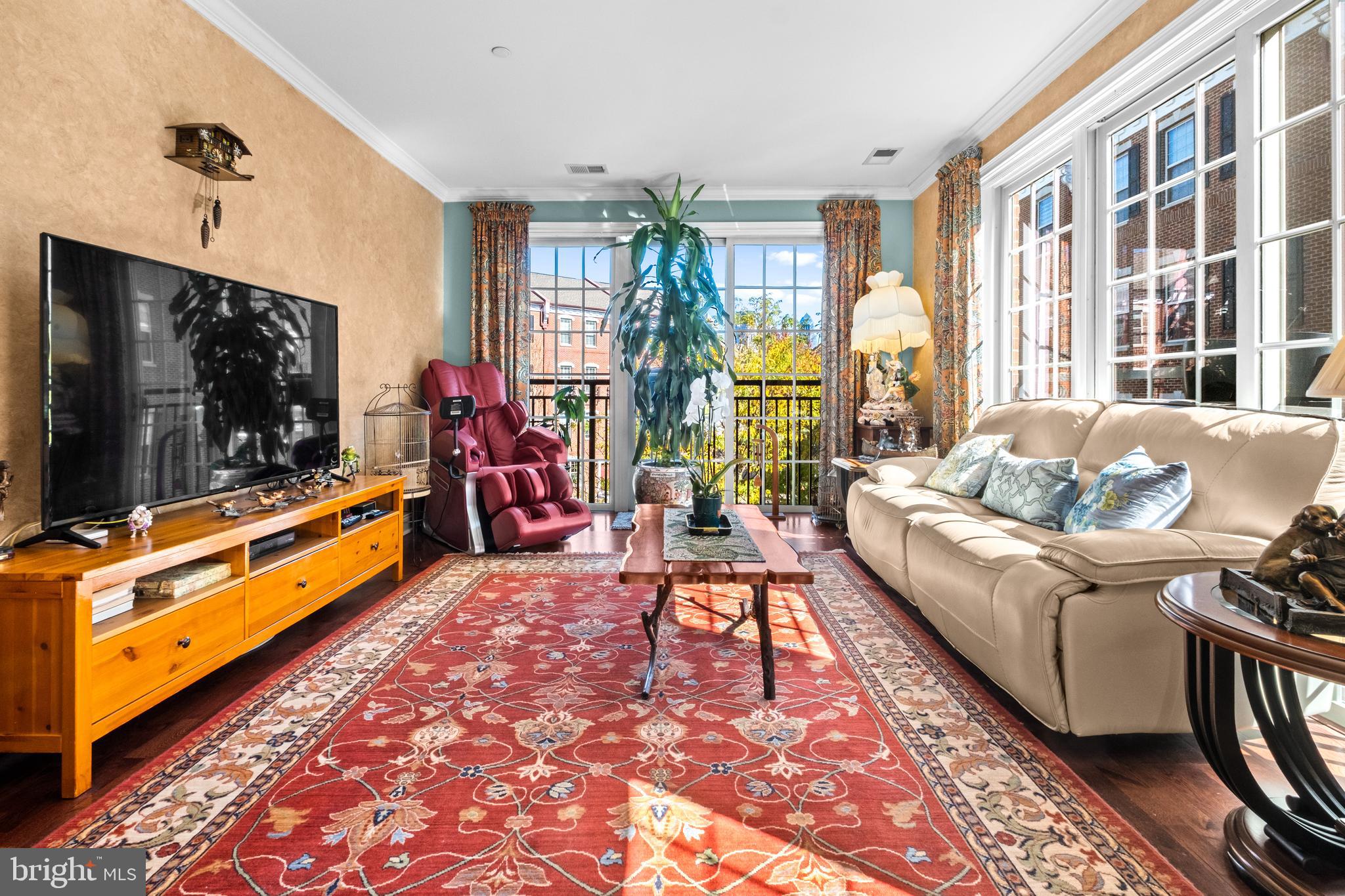 600 Commodore Court, Unit 2631 Philadelphia, PA 19146 - Photo 7 of 45 a living room with furniture and a flat screen tv