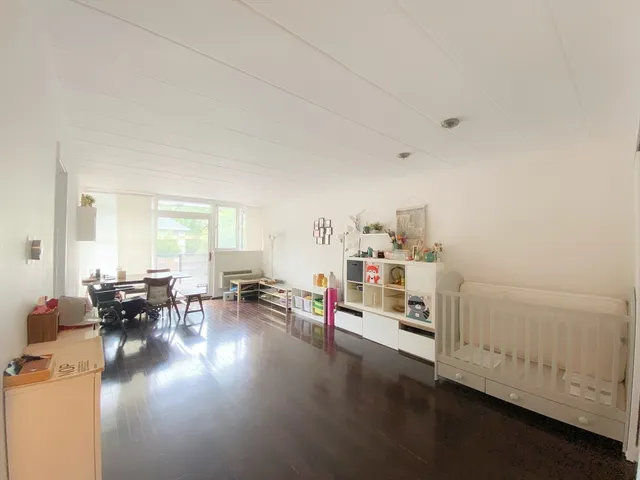 a view of livingroom with furniture and lounge chair