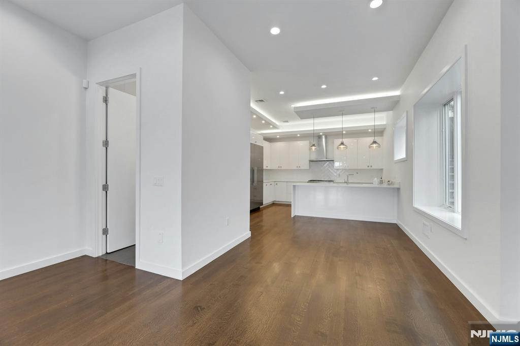 714 Undercliff Avenue, Unit 714 Edgewater, NJ 07020 - Photo 11 of 45 a view of a kitchen with wooden floor