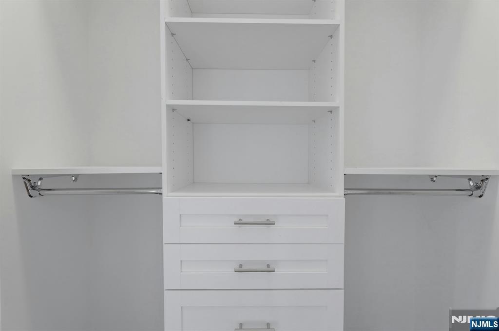 714 Undercliff Avenue, Unit 714 Edgewater, NJ 07020 - Photo 23 of 45 a view of an empty walk in closet