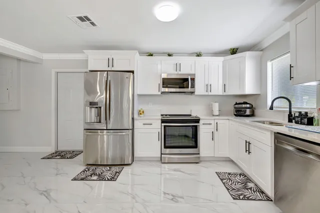 a room with furniture and a wooden floor