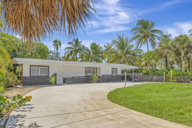 a house view with a garden space