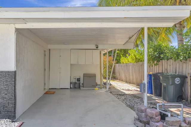 a view of a patio with wooden floor