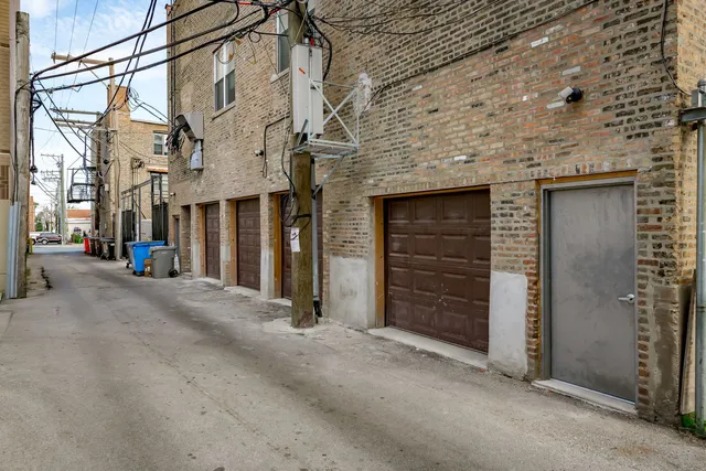 a view of a car park in front of building