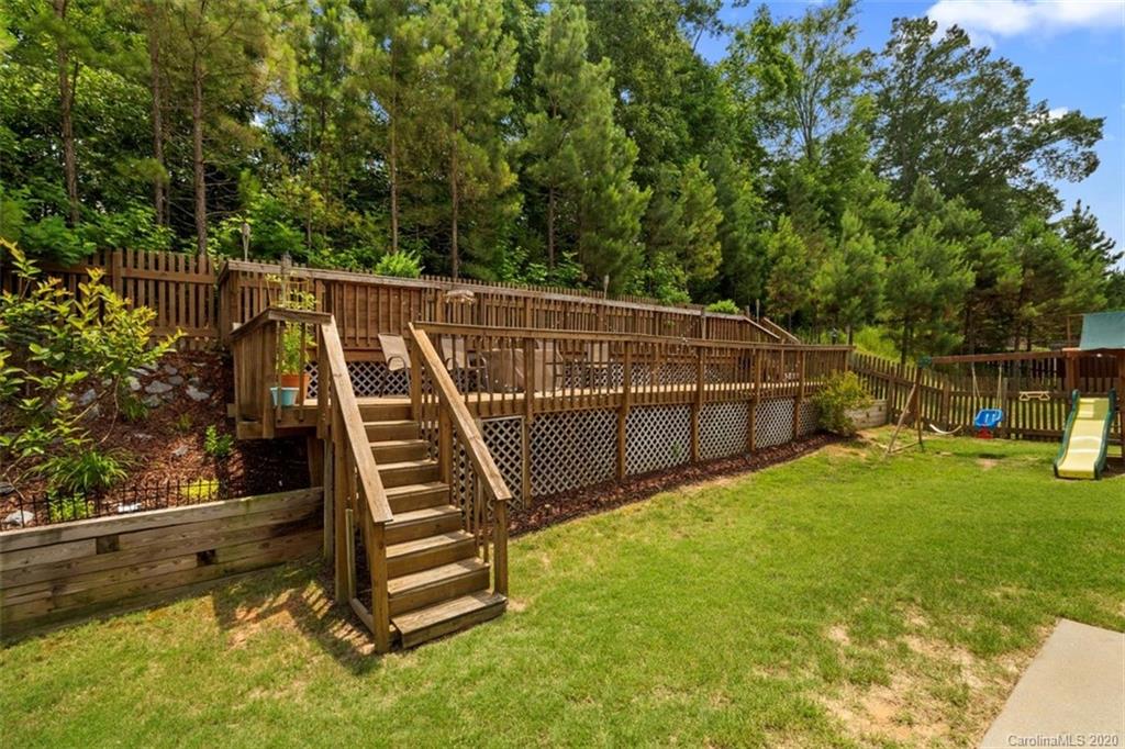 2966 Arthur Road Indian Land, SC 29707 - Photo 40 of 48 a view of a backyard with stairs