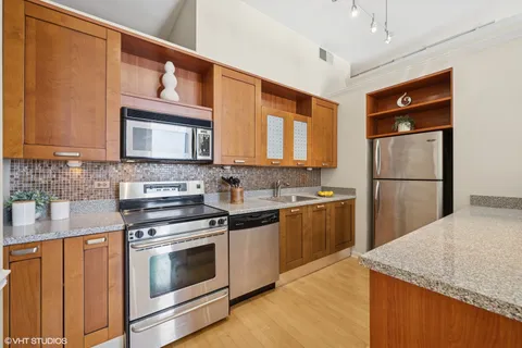 a view of a dining room with furniture and window