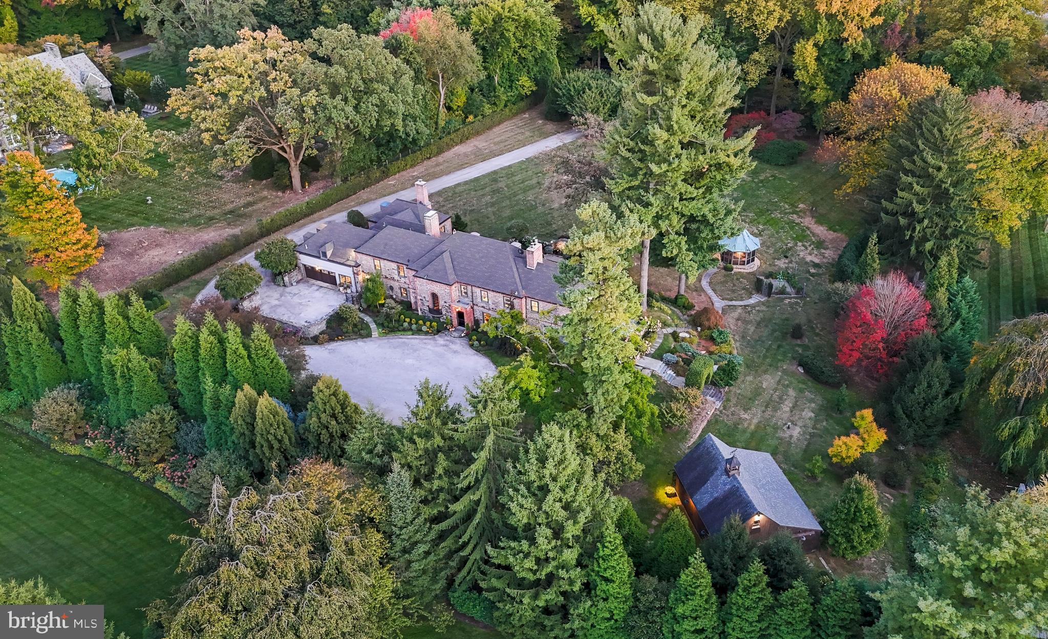620 North Spring Mill Road Villanova, PA 19085 - Photo 3 of 118 an aerial view of residential house with outdoor space and trees all around