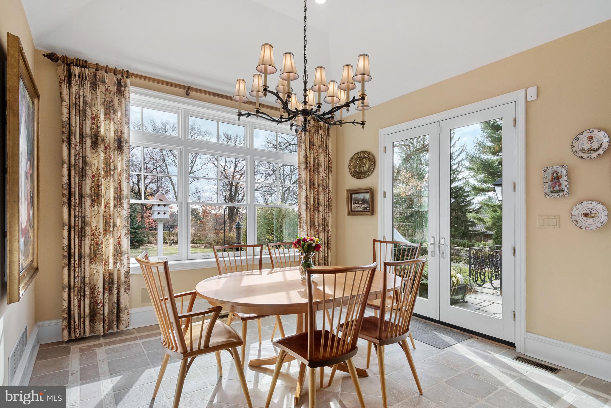 620 North Spring Mill Road Villanova, PA 19085 - Photo 38 of 118 a view of a dining room with furniture wooden floor and chandelier