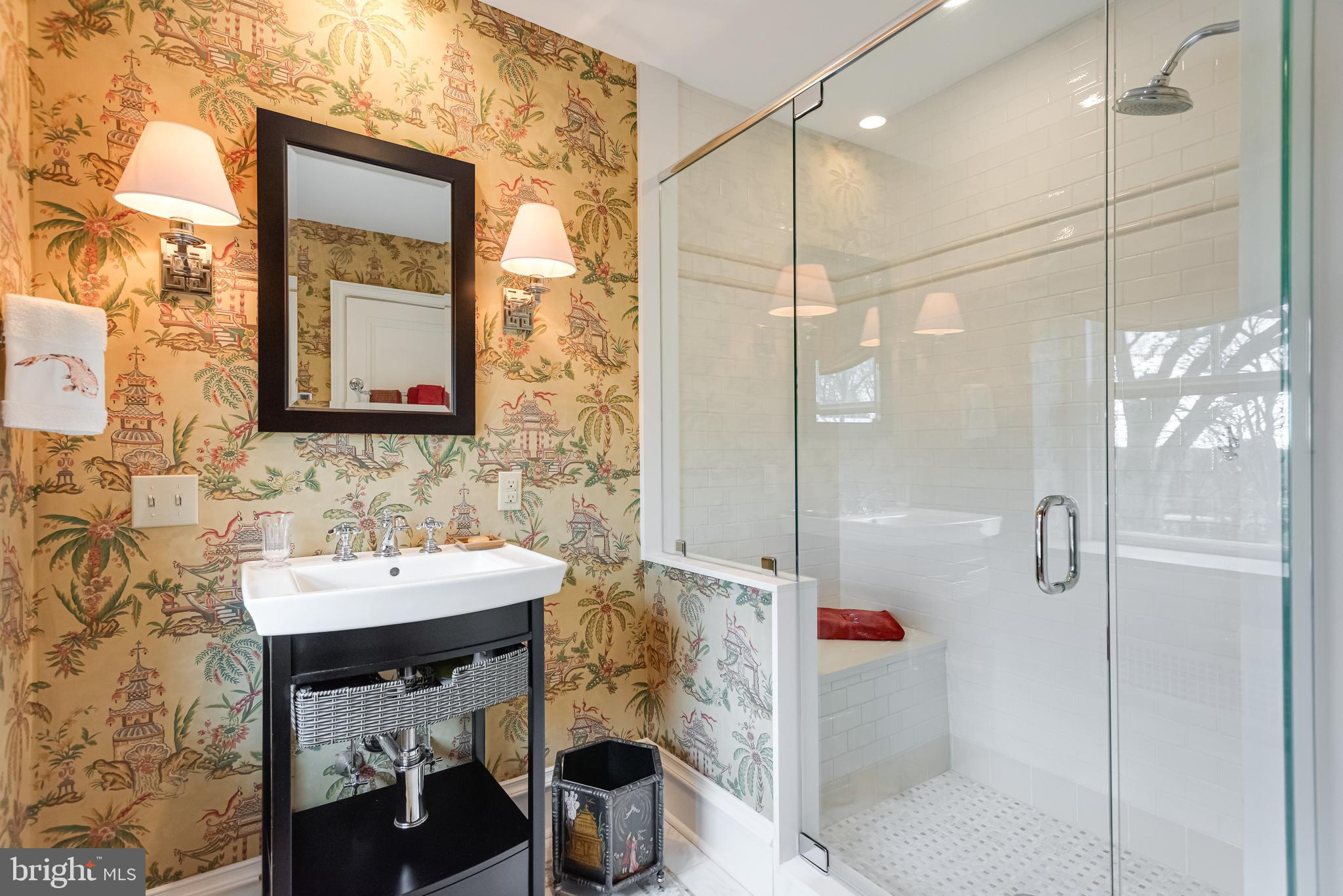 620 North Spring Mill Road Villanova, PA 19085 - Photo 59 of 118 a bathroom with a sink and mirror with shower