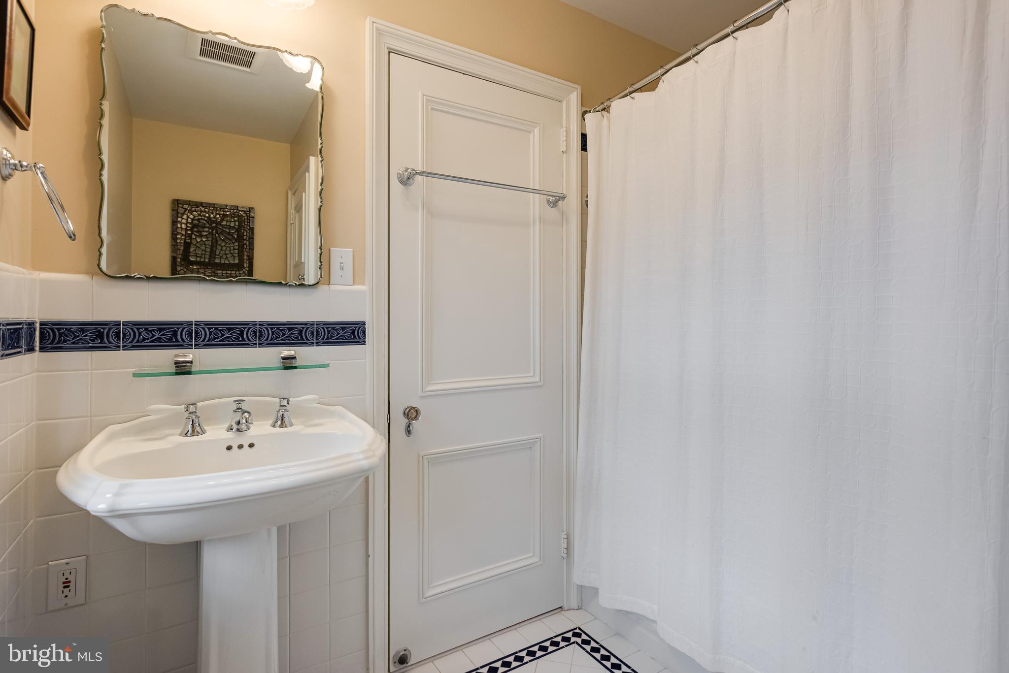 620 North Spring Mill Road Villanova, PA 19085 - Photo 62 of 118 a bathroom with a sink and a mirror