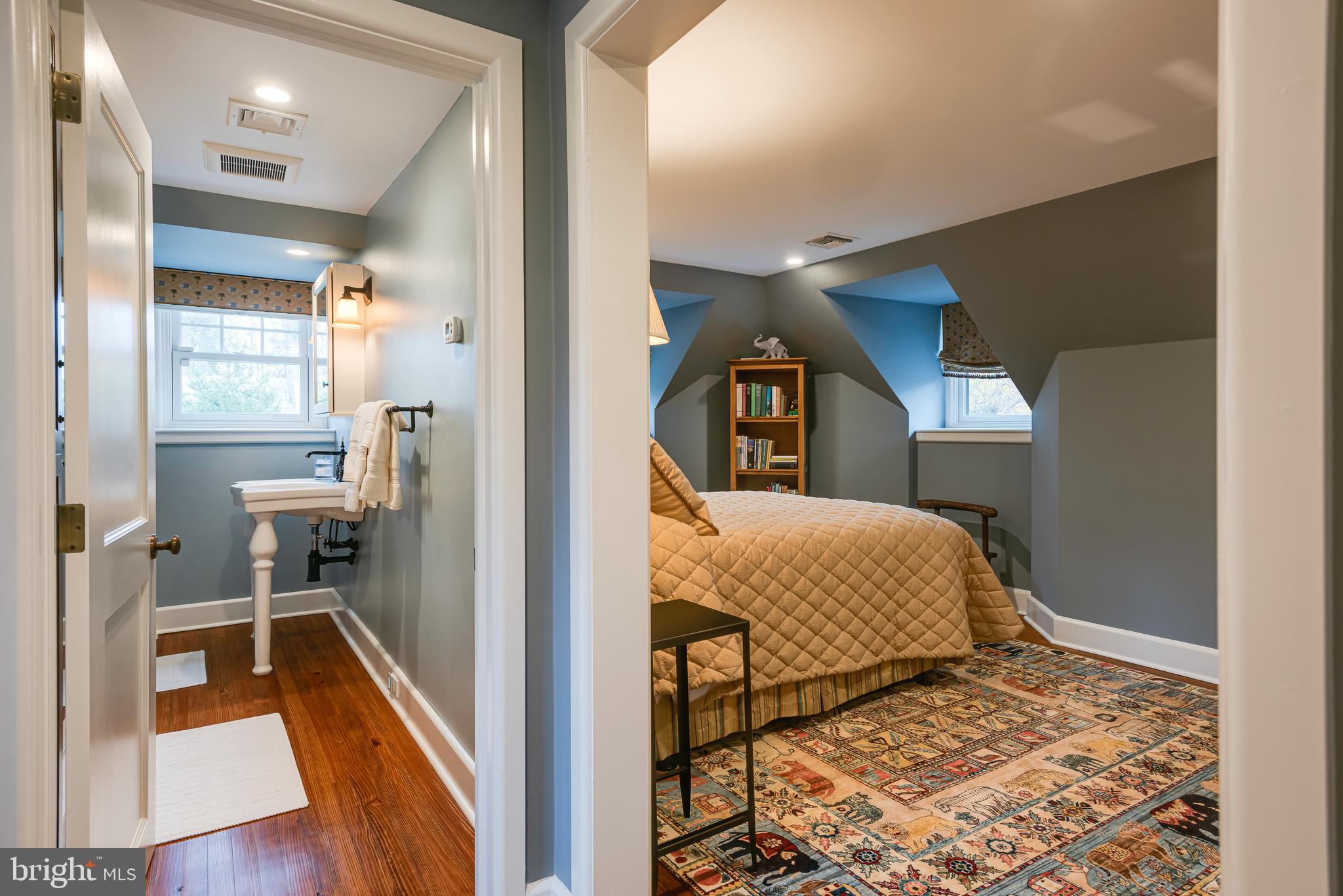 620 North Spring Mill Road Villanova, PA 19085 - Photo 63 of 118 a en suite bathroom with a sink and a mirror