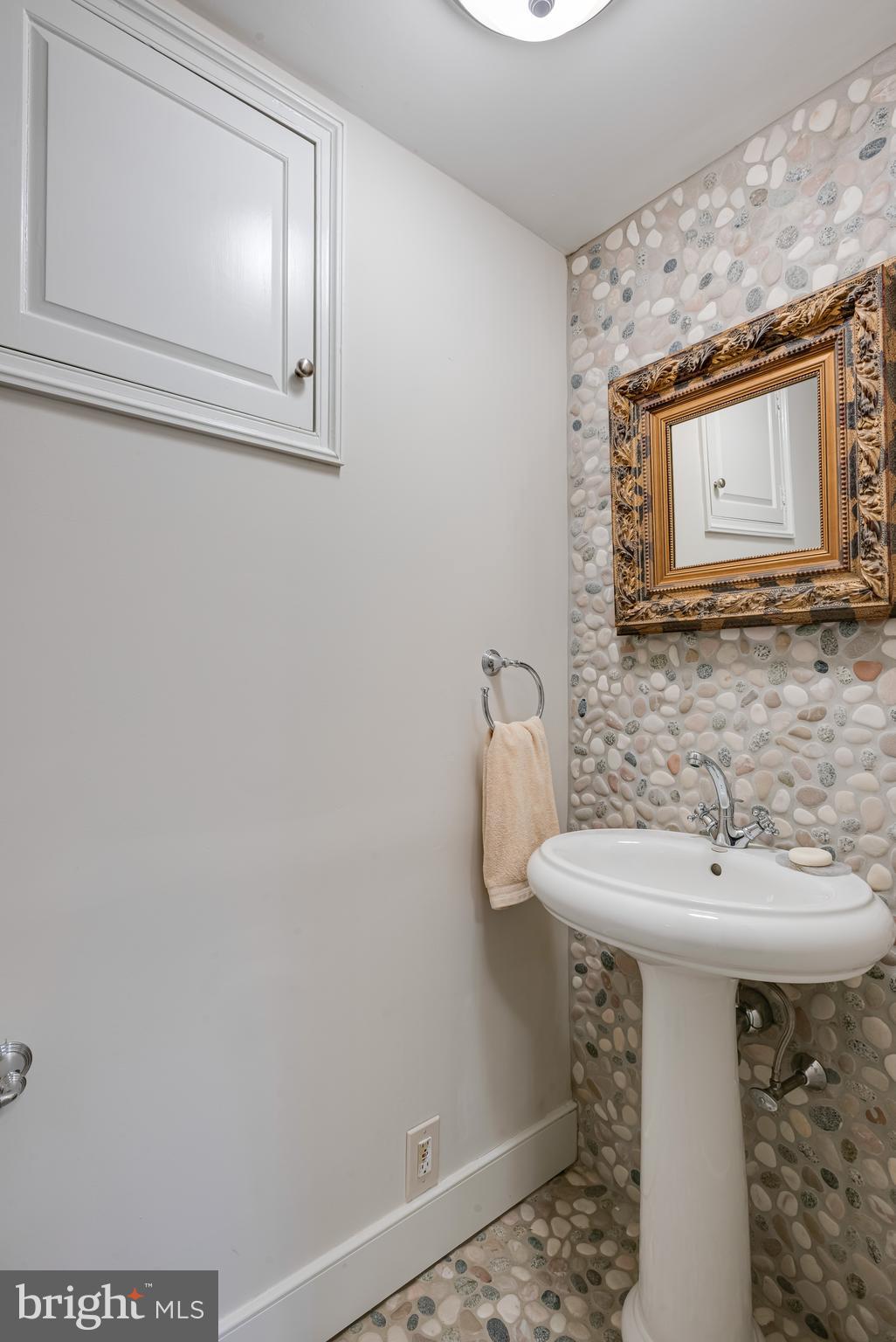 620 North Spring Mill Road Villanova, PA 19085 - Photo 68 of 118 a bathroom with a sink a mirror and vanity