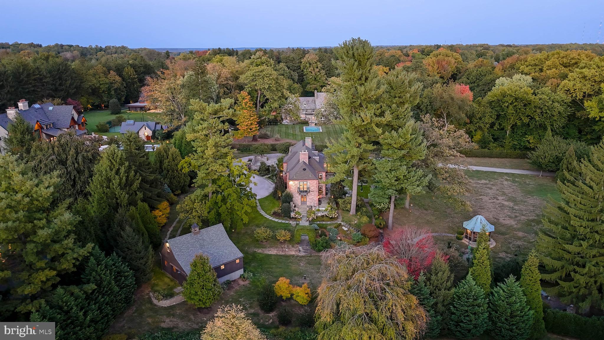 620 North Spring Mill Road Villanova, PA 19085 - Photo 72 of 118 an aerial view of residential house with outdoor space and trees all around