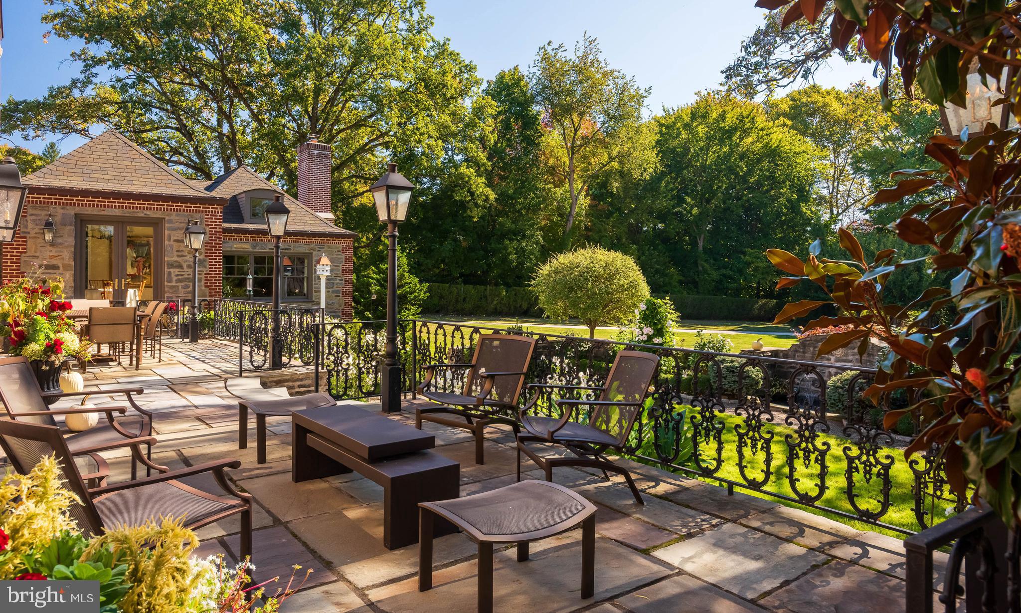 620 North Spring Mill Road Villanova, PA 19085 - Photo 87 of 118 a view of a chairs and table in a patio