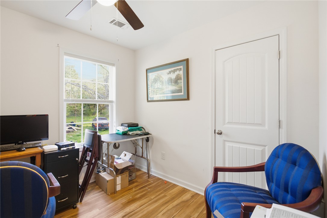 310 North Church Street Walhalla, SC 29691 - Photo 20 of 30 This versatile 3rd bedroom offers a bright window and durable flooring.