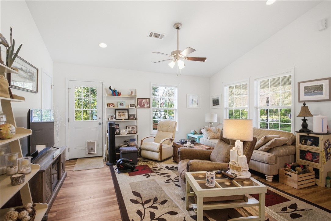 310 North Church Street Walhalla, SC 29691 - Photo 7 of 30 This bright living space features abundant natural light and vaulted ceilings.