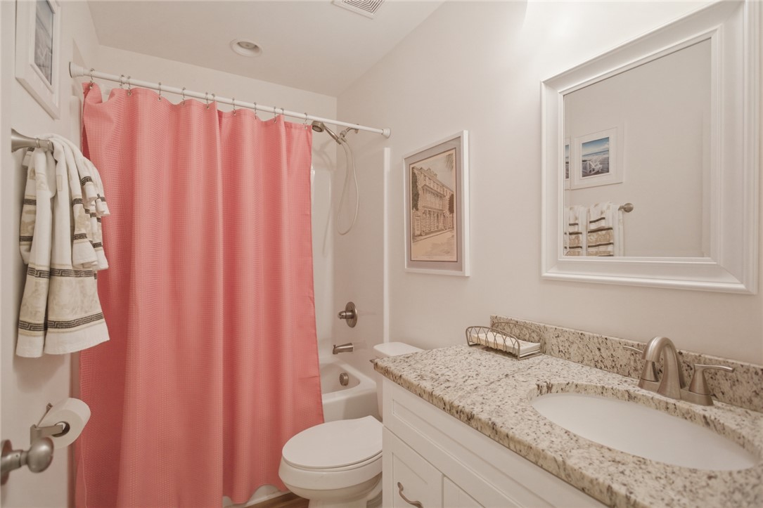 310 North Church Street Walhalla, SC 29691 - Photo 10 of 30 This bathroom features a contemporary vanity with granite counters and a clean, functional design.