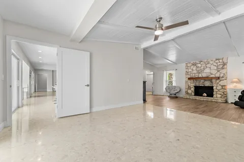 a view of a swimming pool with a patio