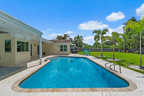 a spacious bedroom with a bed and a window