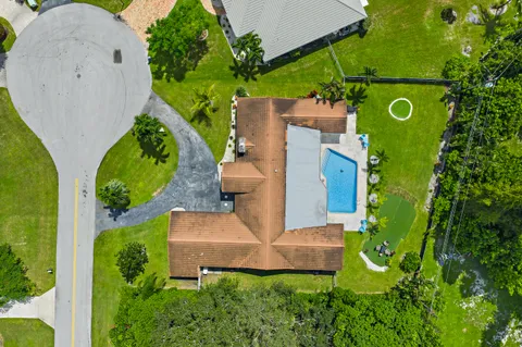 $1,125,000 | 437 North Country Club Drive, Atlantis, FL 33462