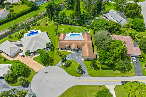 $1,125,000 | 437 North Country Club Drive, Atlantis, FL 33462