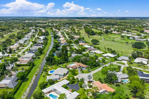 $1,125,000 | 437 North Country Club Drive, Atlantis, FL 33462