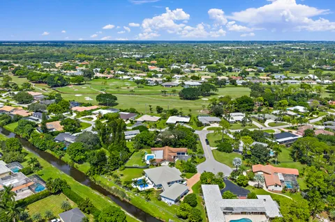 $1,125,000 | 437 North Country Club Drive, Atlantis, FL 33462