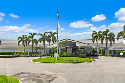 $1,125,000 | 437 North Country Club Drive, Atlantis, FL 33462