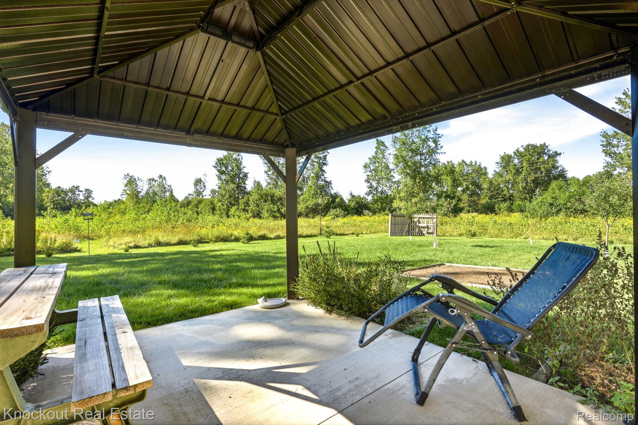 5727 Mackinaw Road Saginaw, MI 48604 - Photo 39 of 60 Covered patio with a concrete surface
